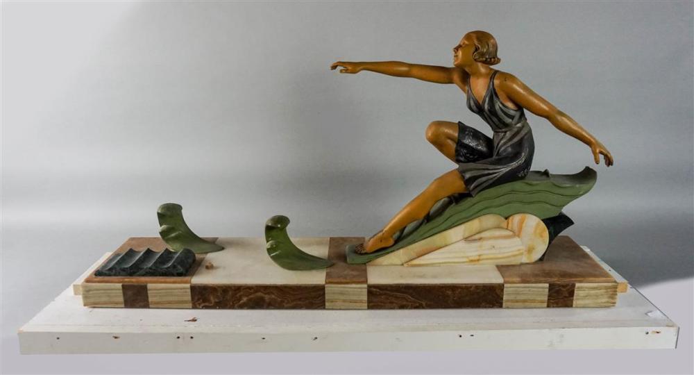 FIGURE OF A WOMAN ON A WAVEFIGURE