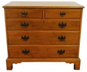 FIGURED MAPLE CHEST OF DRAWERS