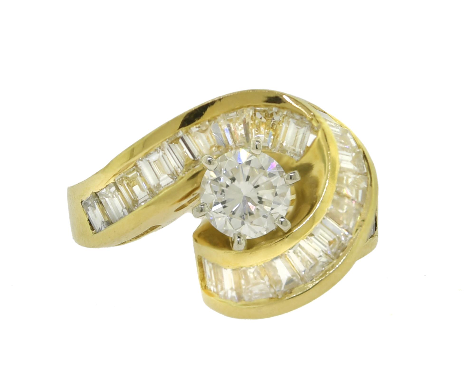 FINE 18K GOLD AND DIAMOND RING.