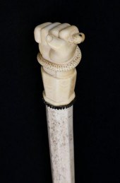 FINE CARVED WHALE IVORY CLENCH