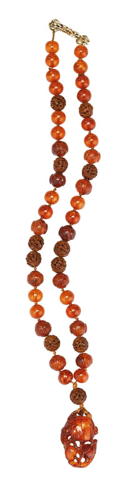 Fine Chinese 14K yellow gold, amber