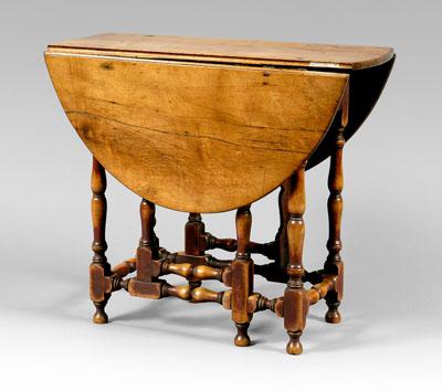 Fine diminutive gate leg table,