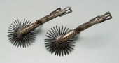 Fine pair brass inlaid gaucho