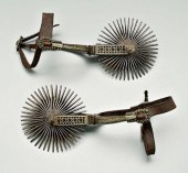 Fine pair silver inlaid gaucho