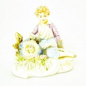 FINE PORCELAIN FIGURINE, BOY S