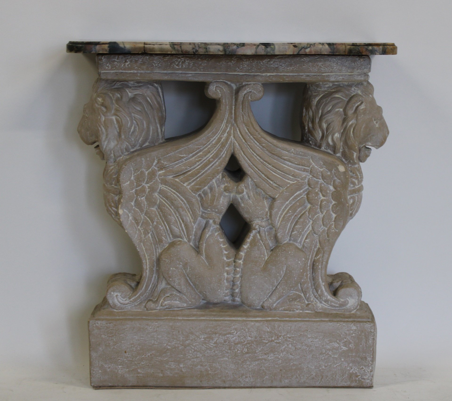FINELY CARVED MARBLETOP GRIFFIN
