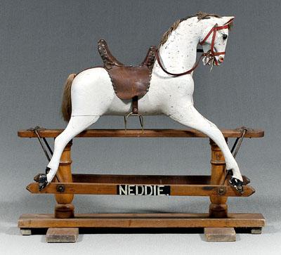 Finely carved rocking horse,
