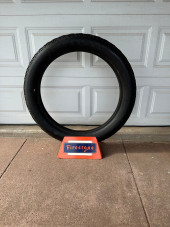 FIRESTONE NON SKID TIRE ON DIS