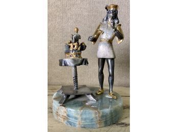 Fitted on a circular onyx base, the