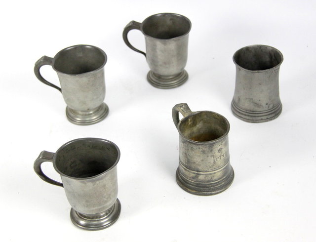 Five 19th Century pewter mugs