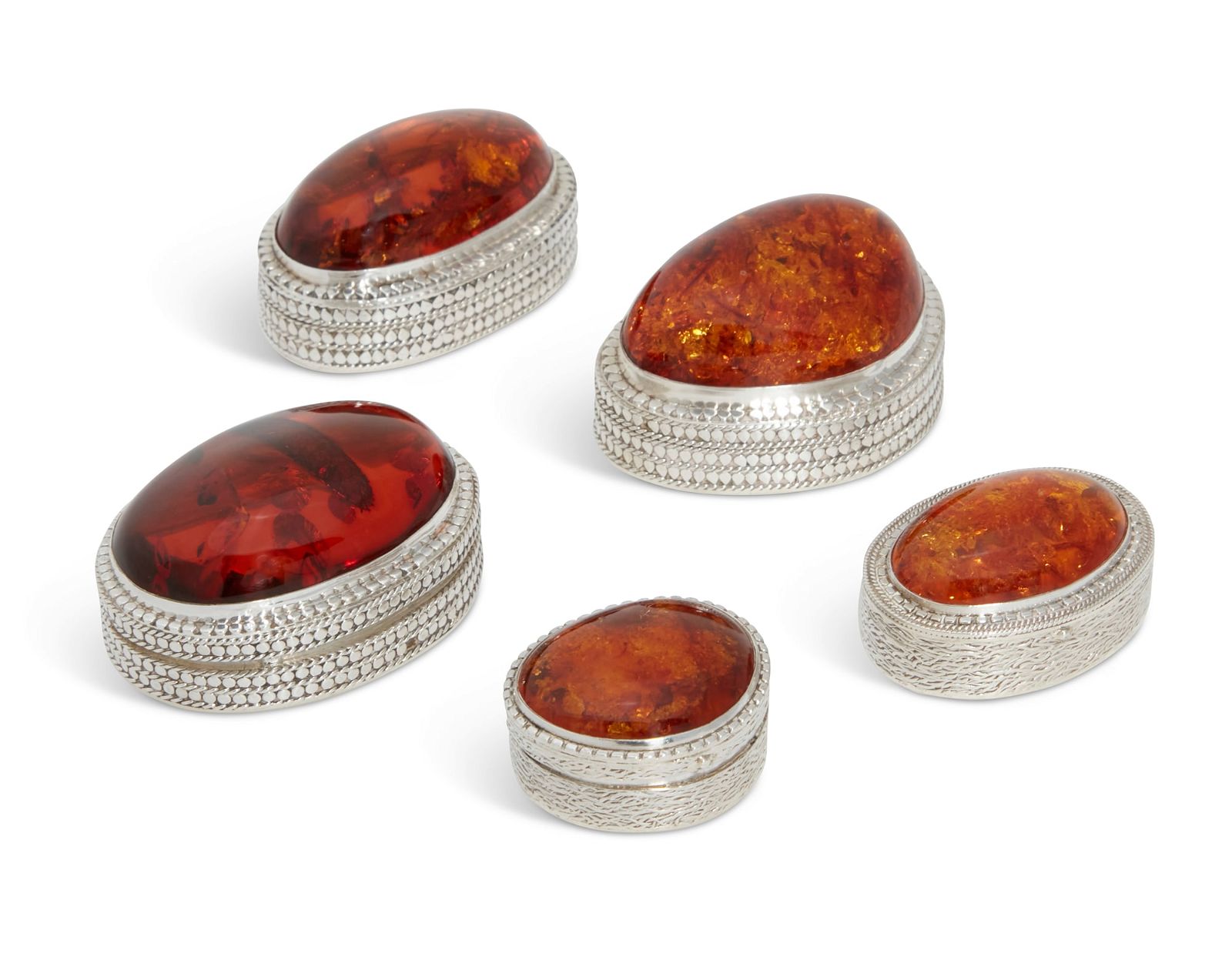 FIVE AMBER MOUNTED STERLING