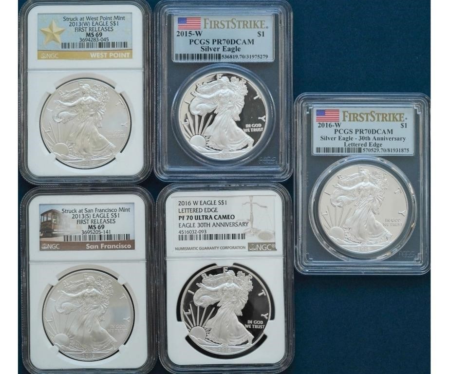Five American silver Eagle one