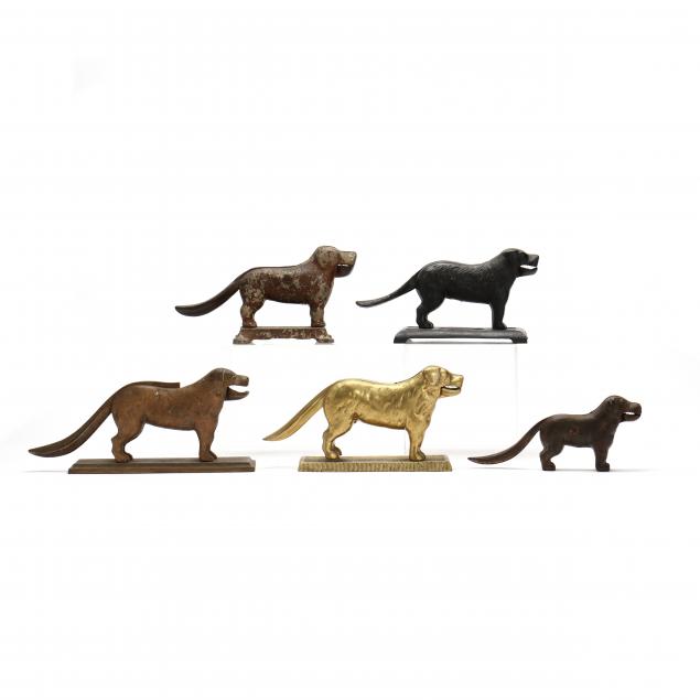 FIVE ANTIQUE CAST METAL DOG
