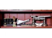 Five antique scales, including