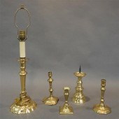 FIVE ASSORTED BRASS CANDLESTIC