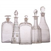 FIVE ASSORTED GLASS DECANTERS