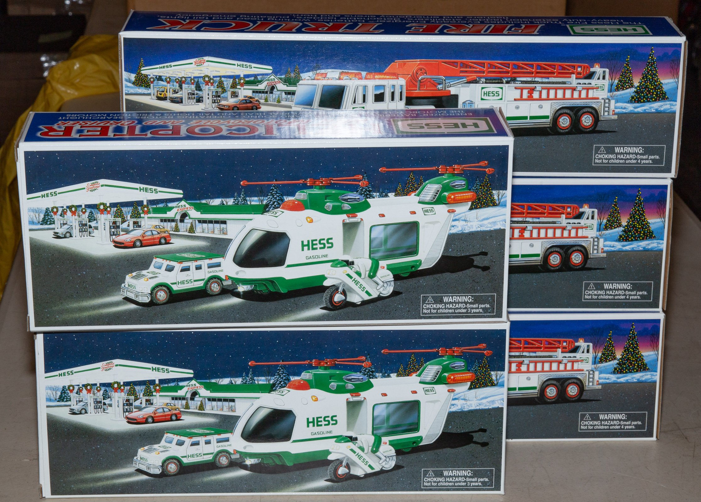 FIVE ASSORTED HESS TRUCKS