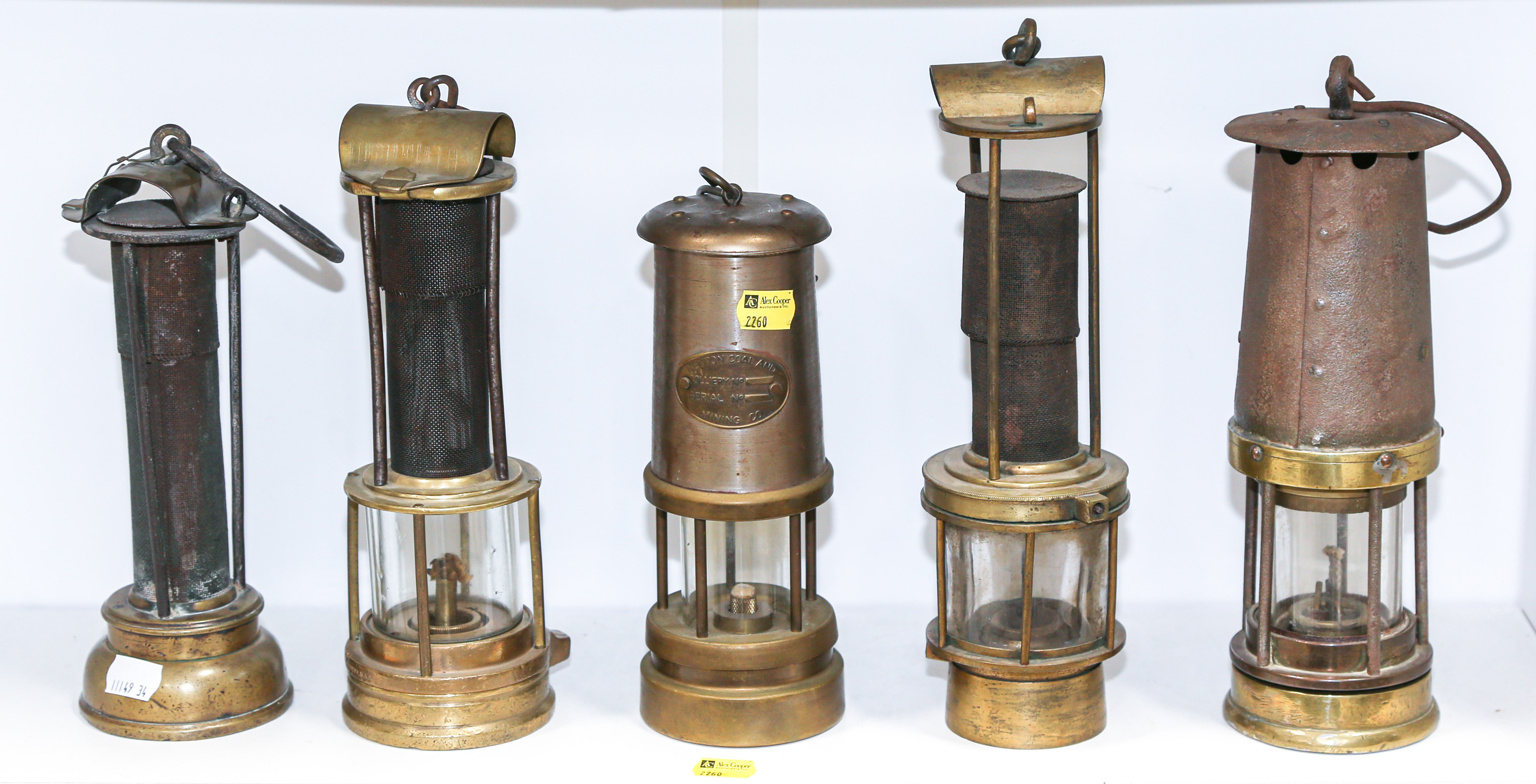 FIVE ASSORTED MINERS' LAMPS Circa