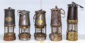 FIVE ASSORTED MINERS' LAMPS La