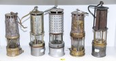 FIVE ASSORTED MINERS' LAMPS La