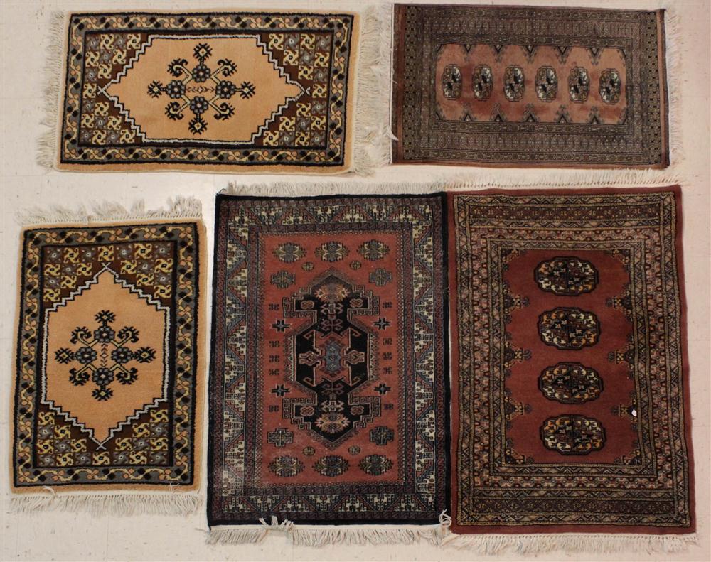 FIVE ASSORTED SMALL ORIENTAL RUGS