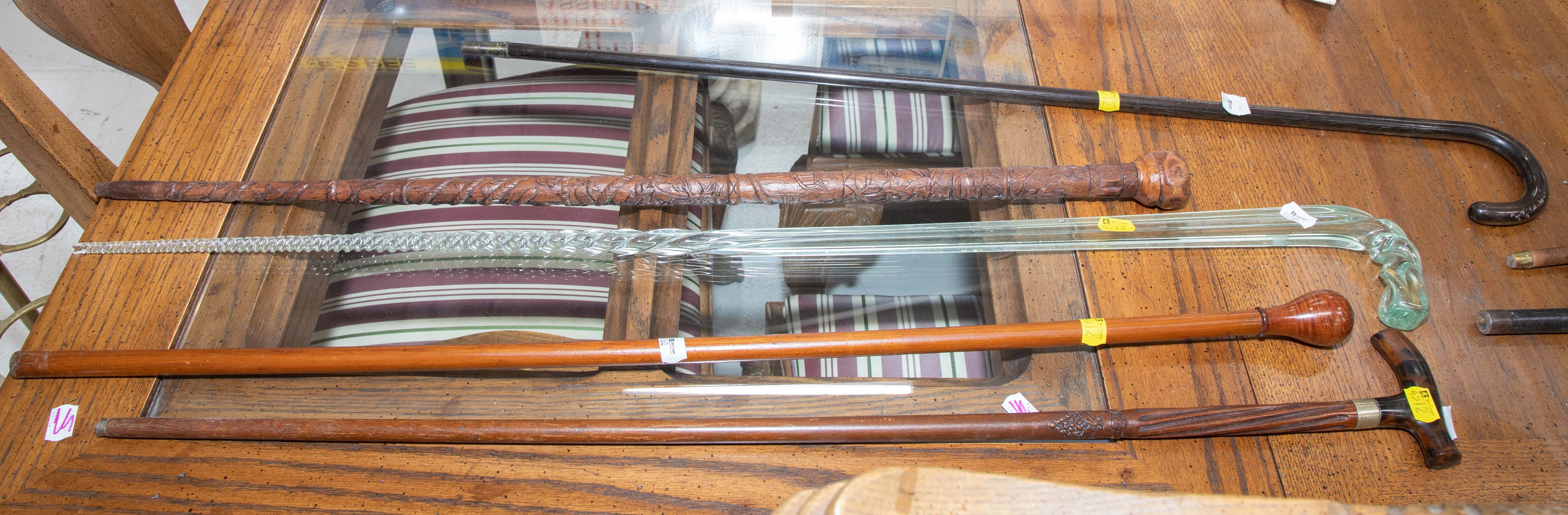 FIVE ASSORTED WALKING STICKS &