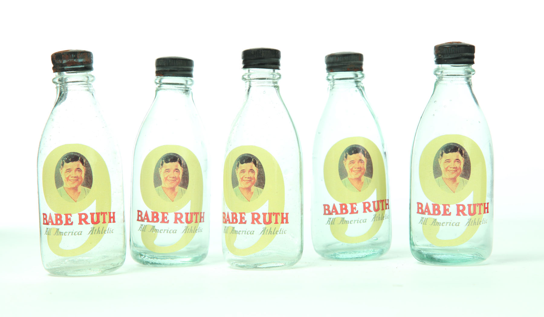 FIVE BABE RUTH SODA BOTTLES. 