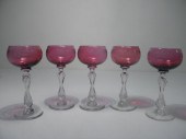 Five Baccarat etched cranberry