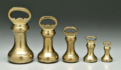 Five bell form brass weights,