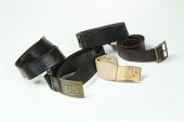 FIVE BELTS AND A BELT PLATE.