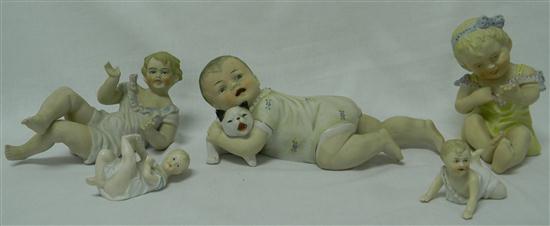 Five bisque piano babies two seated