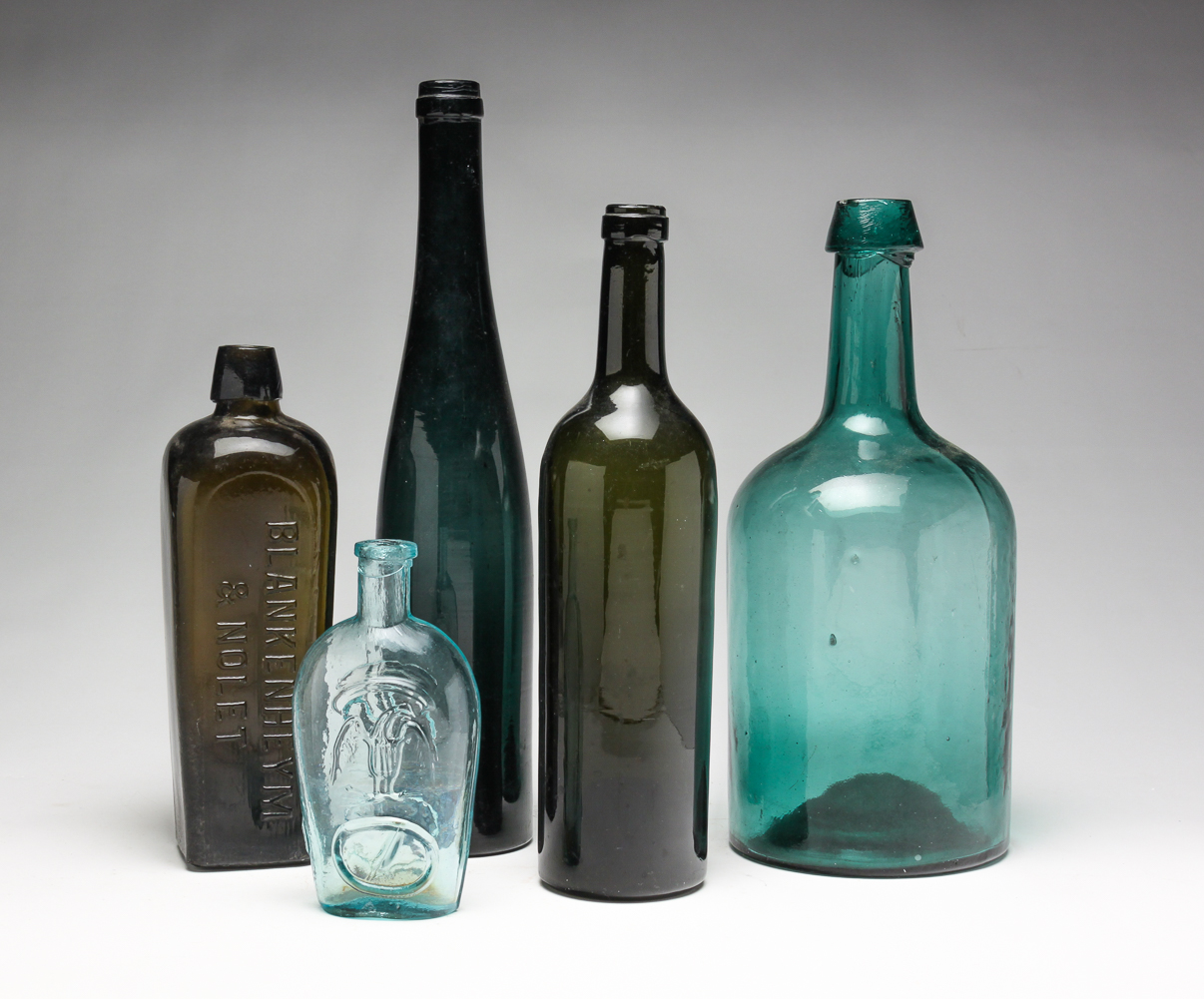 FIVE BLOWN GLASS BOTTLES.