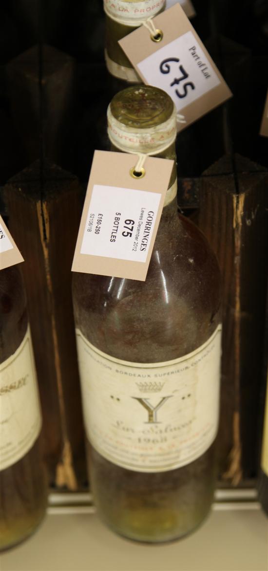 Five bottles including two of the