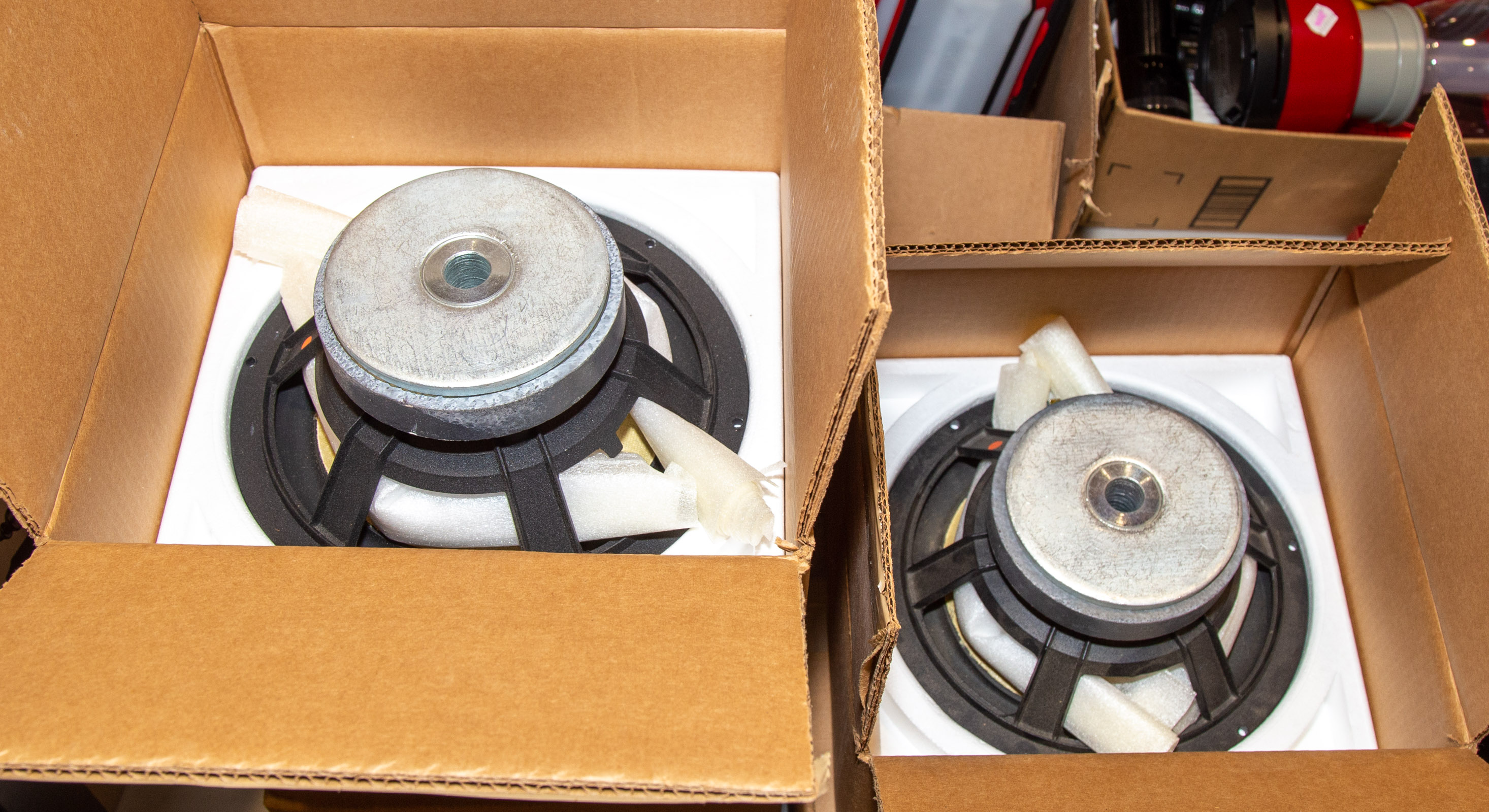 FIVE BOXED AUDIO WOOFER SPEAKERS .