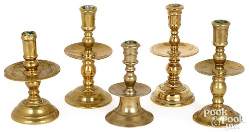 FIVE BRASS CANDLESTICKS,