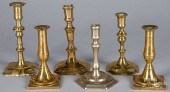 FIVE BRASS CANDLESTICKS, AND A