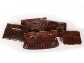 FIVE BROWN ALLIGATOR SKIN CLUT