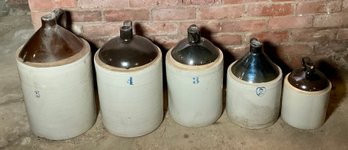Five brown and white stoneware