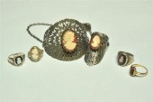FIVE CAMEO PIECES. Three rings