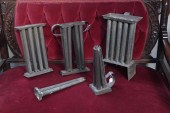 FIVE CANDLE MOLDS. Tin candle