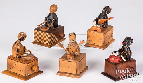 FIVE CARVED AND PAINTED KNOB