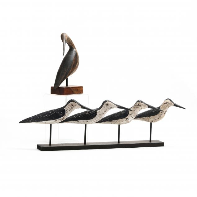FIVE CARVED AND PAINTED WOODEN