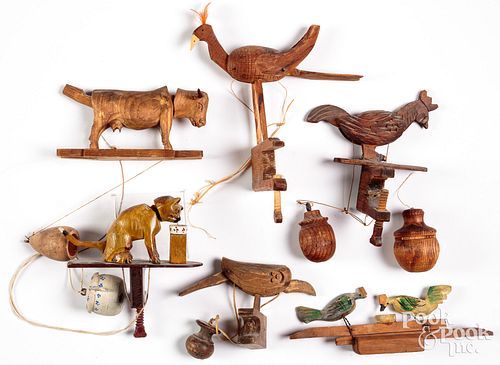 FIVE CARVED ANIMATED SWING