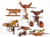 FIVE CARVED ANIMATED SWING BAL