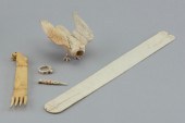 FIVE CARVED BONE OR IVORY ITEM
