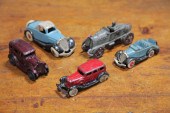FIVE CAST IRON AUTOMOBILES.  A