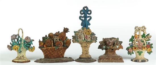 FIVE CAST-IRON DOOR STOPS. 