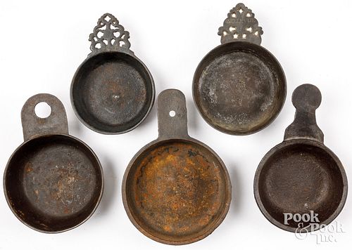 FIVE CAST IRON PORRINGERS, EARLY