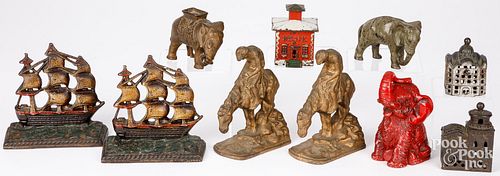 FIVE CAST IRON STILL BANKS,