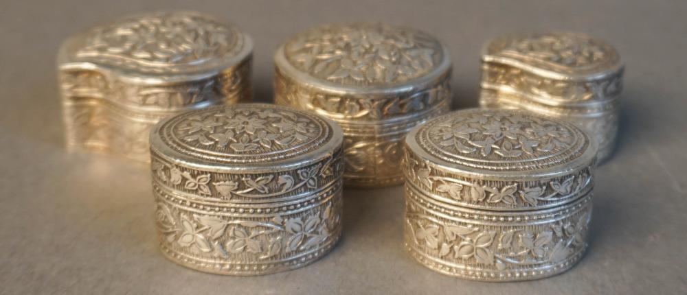 FIVE CHASED STERLING SILVER PILL